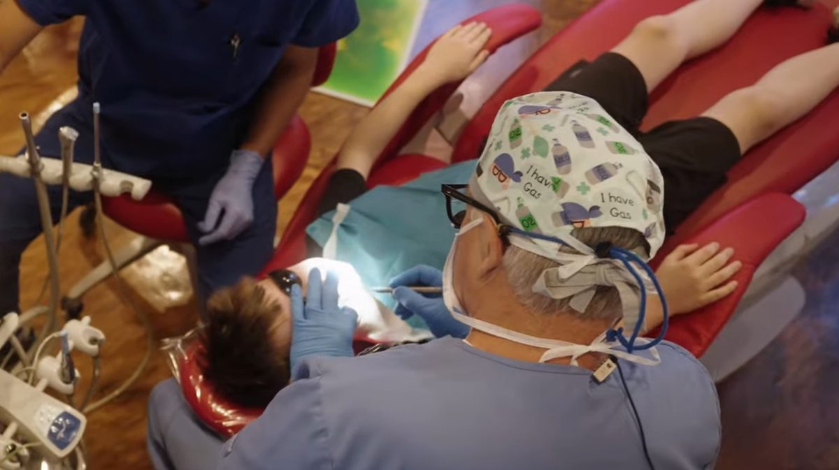 Dr. Wilkerson treating a young patient at The Kid's Place in Boerne, TX