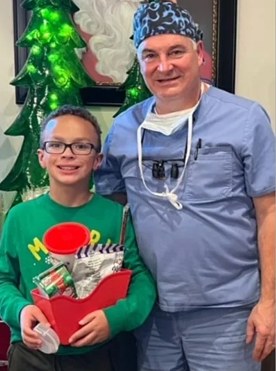 Dr. Wilkerson with a young patient at The Kid’s Place in Boerne