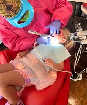 Young patient getting a gentle teeth cleaning at The Kid’s Place in Boerne